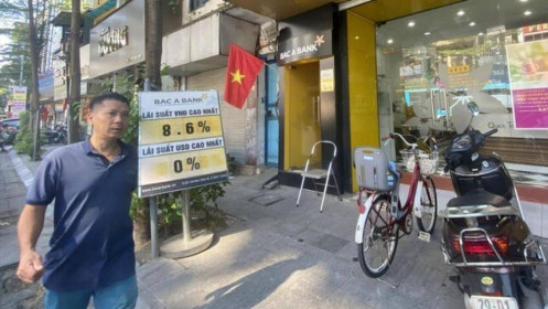 Lãi suất 'làm khó' chứng khoán, bất động sản