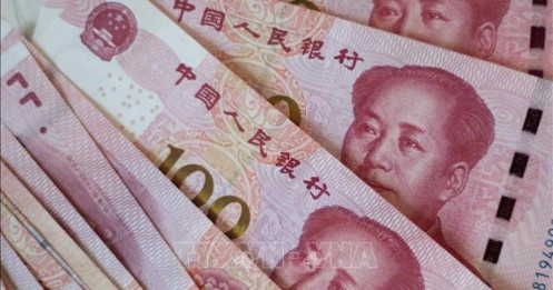 Đồng NDT giảm xuống mức thấp nhất 2 tháng so với đồng USD