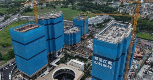 Trung Quốc “bỏ ngỏ” cuộc khủng hoảng BĐS?