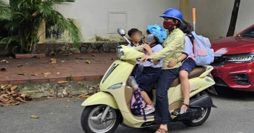 Mức phạt 9 triệu đồng cho trẻ ngồi trước xe máy: Không phải để “hành” phụ huynh