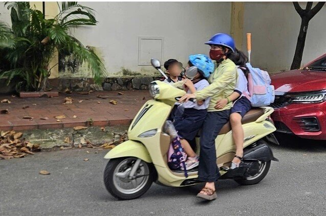 Mức phạt 9 triệu đồng cho trẻ ngồi trước xe máy: Không phải để “hành” phụ huynh