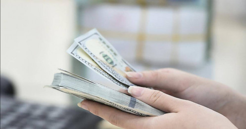 Đổi ngoại tệ ở 'chợ đen' bị lừa, báo công an có bị phạt thêm không?