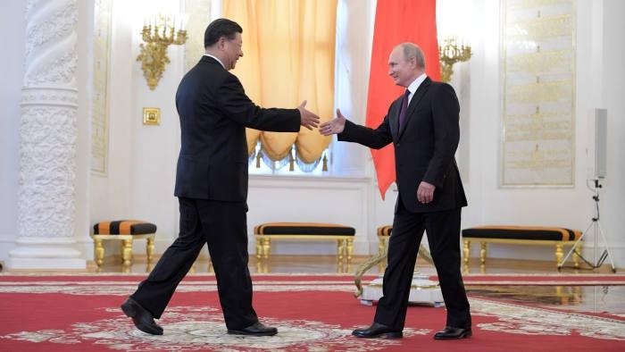 Ông Putin nói Huawei bị Mỹ ‘đẩy khỏi thị trường toàn cầu một cách thô bạo’