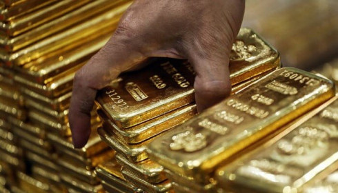 Giá vàng thế giới đạt đỉnh 1 tháng, USD tự do sụt mạnh