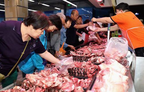 Trung Quốc đảm bảo nguồn cung thịt lợn dịp Tết