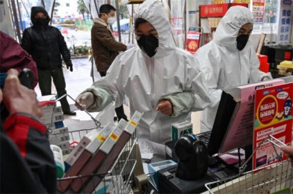 Bắc Kinh khó giữ cam kết tăng mua hàng hóa của Mỹ vì virus corona