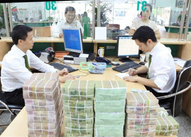 Ngân hàng ‘ôm’ vốn, chờ diễn biến hậu Covid-19