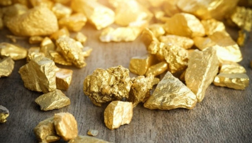 Vàng thế giới vẫn tăng 5 tuần liền dù lùi nhẹ trong phiên