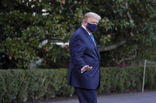 Hình ảnh ông Trump lên trực thăng rời Nhà Trắng đến viện điều trị Covid-19