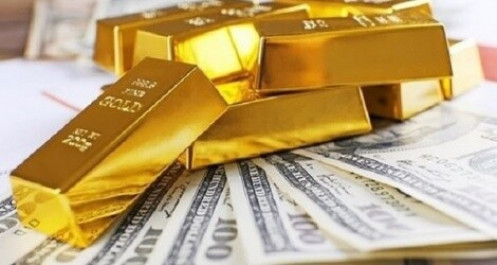 Giá vàng quốc tế áp sát 1.900 USD/ounce  trước sự trượt dốc của USD