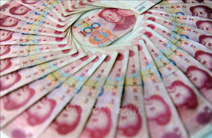 PBoC nâng tỷ giá của đồng NDT lên mức cao nhất trong 30 tháng