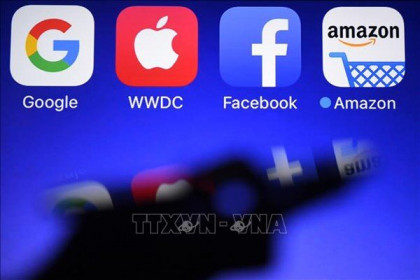 Doanh thu của Apple và Facebook tăng lần lượt 21 và 33%