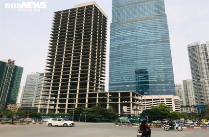 Tổng Công ty Xi măng đổ bao nhiêu tiền vào những tòa nhà, đất vàng bỏ hoang?