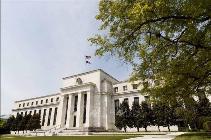 Bảng cân đối kế toán của Fed lần đầu tiên cán mốc 8.000 tỷ USD