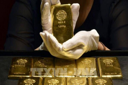 Giá vàng thế giới tăng gần 1% trong phiên 14/7