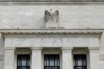 Fed dự kiến giảm chương trình mua tài sản trong năm nay