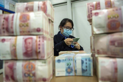 Trung Quốc kiềm chế mức tăng mạnh của đồng Nhân dân tệ so với Đô la Mỹ