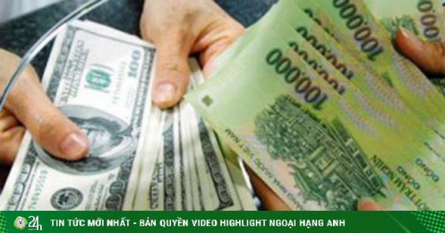 Sau khi điều chỉnh biên độ tỷ giá, tiền đồng đã mất giá bao nhiêu?