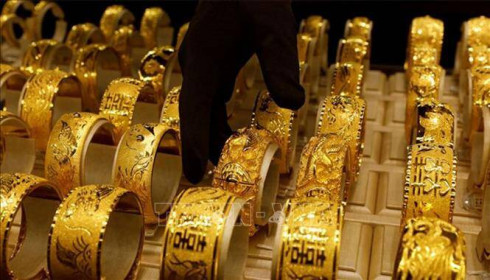 Giá vàng châu Á giảm do đồng USD tăng