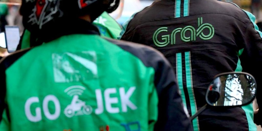 Grab tính thâu tóm đối thủ GoTo