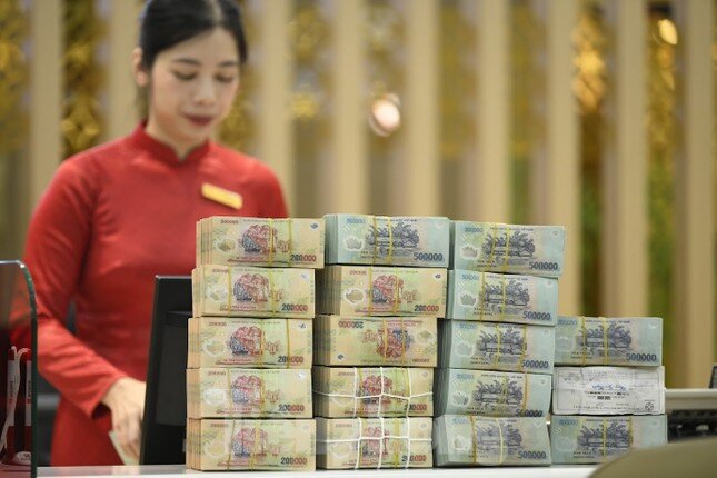 Dự báo lãi suất ngân hàng trước áp lực thuế quan của Mỹ ảnh 1