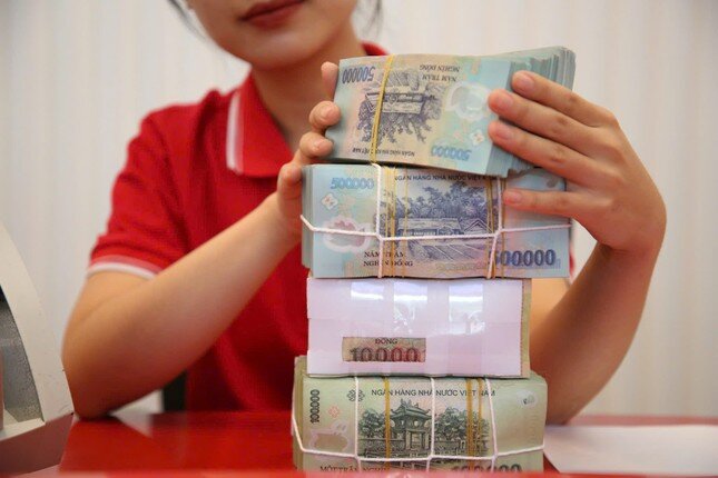 Lãi suất huy động tiếp đà giảm ảnh 1