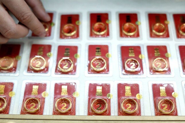 Giá vàng nhẫn bất ngờ giảm, USD cao chưa từng có ảnh 1