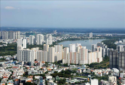 'Đòn bẩy' thể chế cho bất động sản