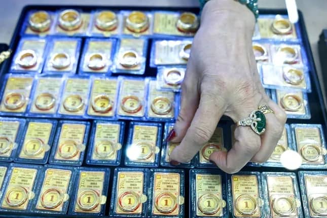 Giá vàng đồng loạt giảm, tỷ giá trung tâm tăng kỷ lục ảnh 1
