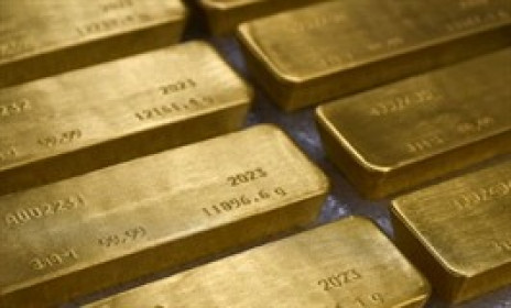 Vàng thế giới lùi nhẹ sau khi Fed tiếp tục chu kỳ nới lỏng