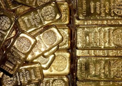 Vàng thế giới giảm khi thị trường cân nhắc lập trường chính sách của Fed