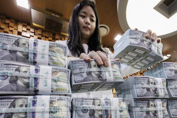 Dự trữ tiền tệ toàn cầu vượt 12.000 tỷ USD